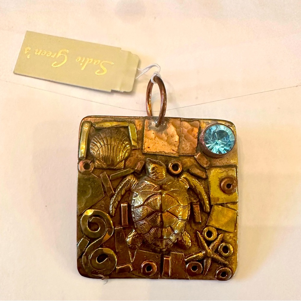 Stunning brass and jewel turtle pendant! Brand new with tags! Super unique!